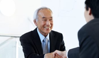 Handshake with business attire.