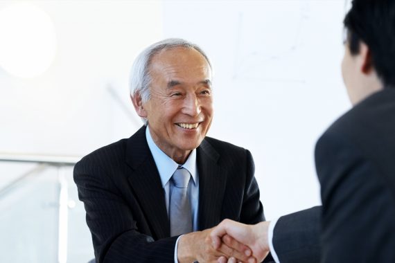 Handshake with business attire.