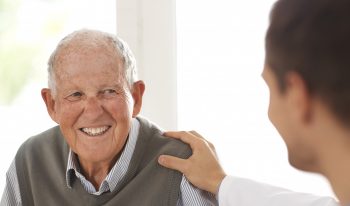 Man smiling at friend