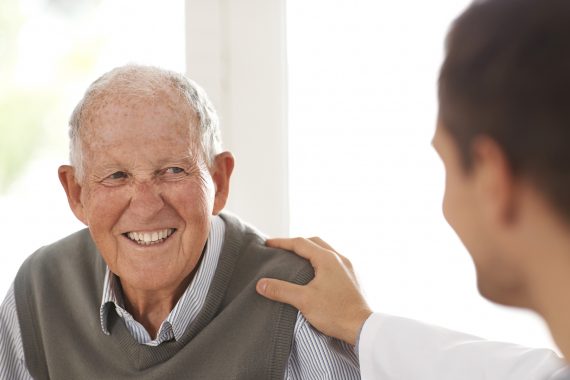 Man smiling at friend