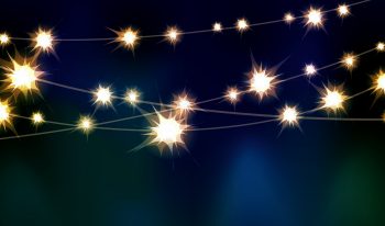 Strings of twinkle lights with blue and green wash lighting.