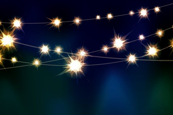 Strings of twinkle lights with blue and green wash lighting.