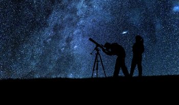 Stargazing using a medium-size telescope.