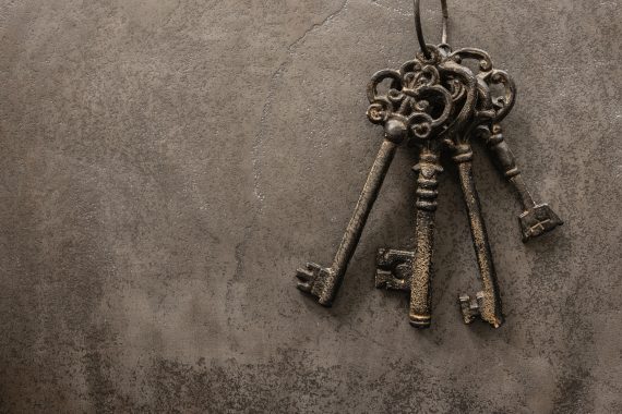 Wrought iron keys on a stone surface